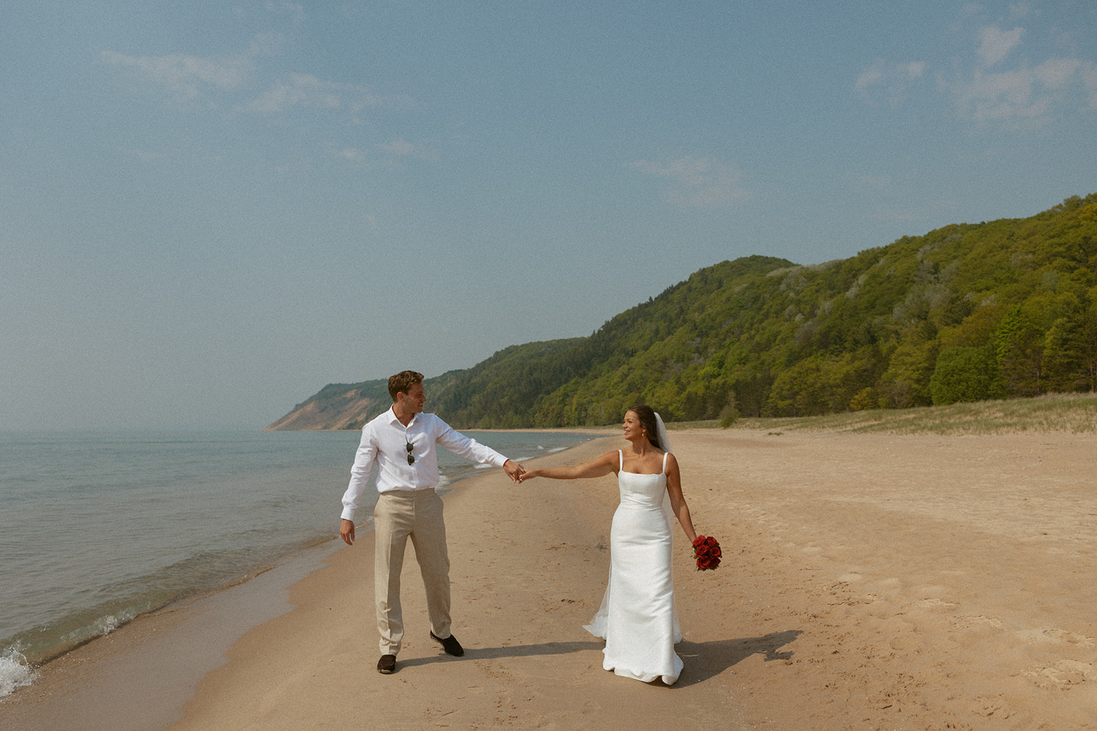 Couple on their elopement day at Esch Beach in Traverse City