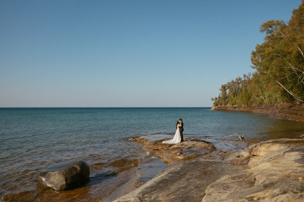 LGBTQ+ couple on their wedding day in Pictured Rocks National Lakeshore